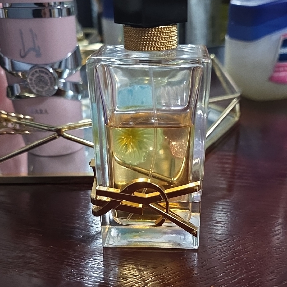 Yves Saint Laurent Gold and Black Perfume Bottle